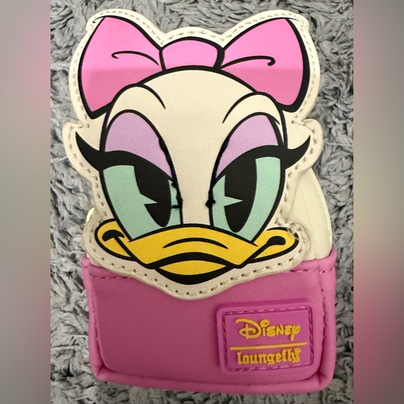 Loungefly Handbags - Loungefly Mystery Bag charm Daisy Duck.